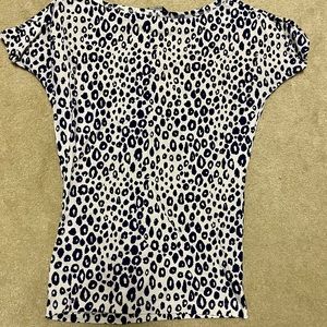 Navy blue cheetah print shirt.